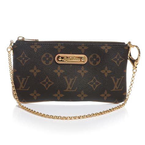 Louis Vuitton Milla Clutch 